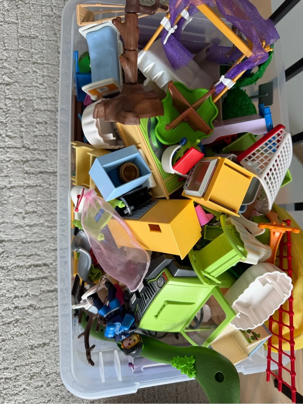 Large bin of Playmobil